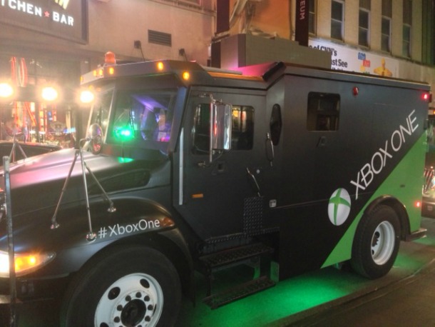Armored trucks deliver Xbox One consoles in New York City, captured by Game Informer. 
